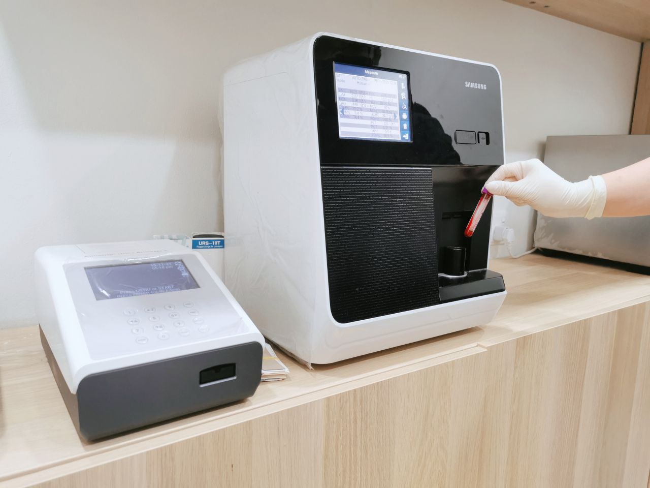 In-house full blood count and urinalysis testing equipment at the clinic