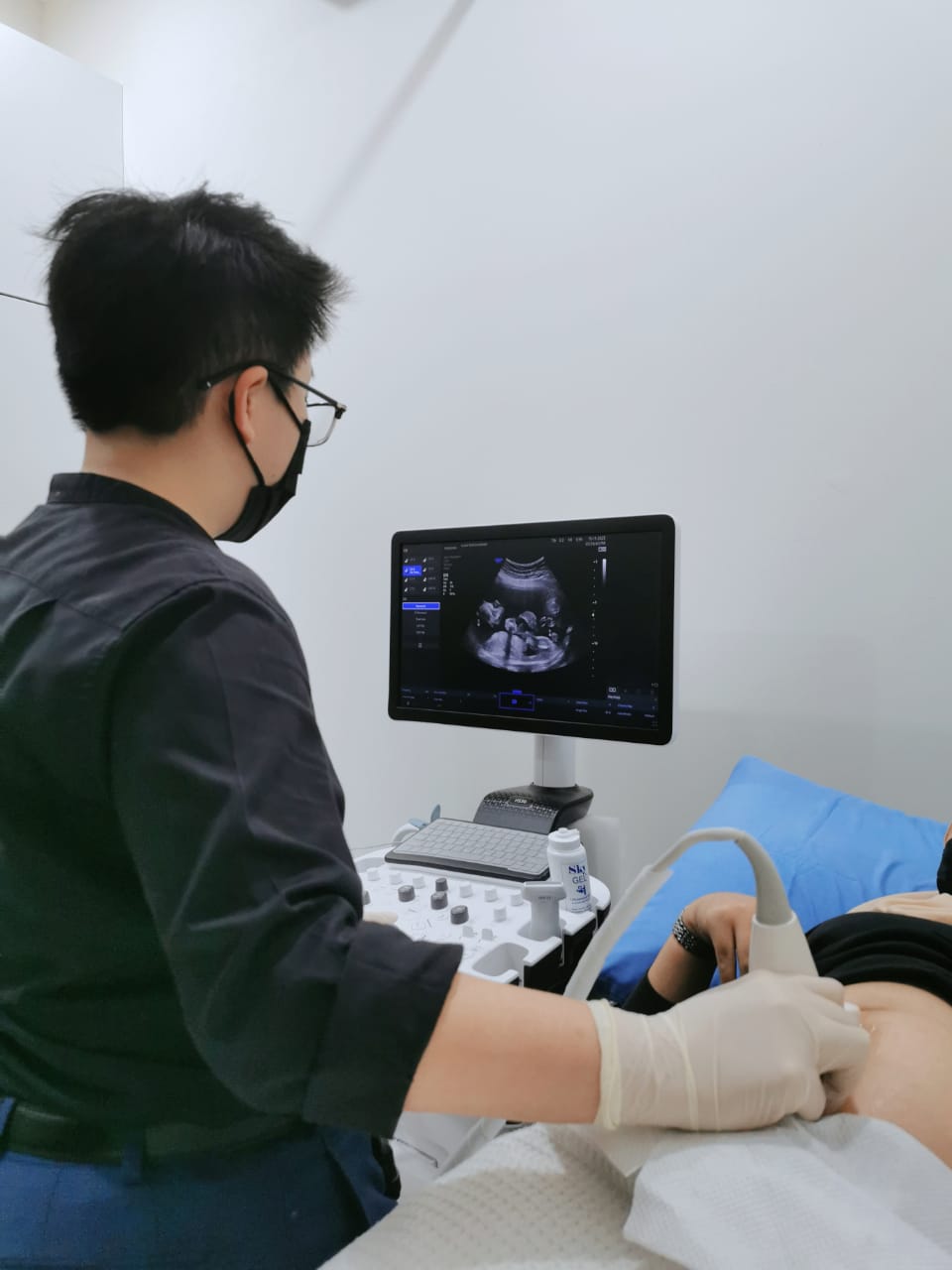 Antenatal ultrasound scan performed by a doctor at the clinic